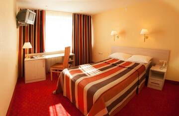 Номер комфорт стандарт с 1 односпальной кроватью в Гостинице Тагил