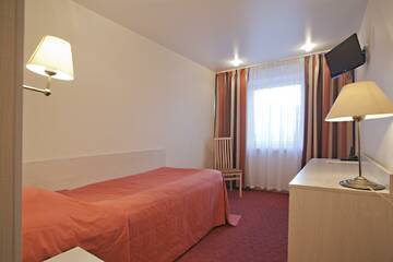 Номер стандарт с 1 односпальной кроватью в Гостинице Тагил